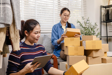 Small business, partnership, warehouse store, woman checking clothing stock in storage area, digital app for distribution, people at work, inventory management, ecommerce startup and retail operation