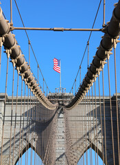 suspension wires upholding the brooklyn bridge structure with th