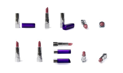 Obraz premium Pink lipstick in a purple tube isolated