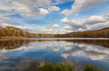 Sawmill Lake in High Point State Park, NJ, on a beautiful Autumn afternoon surrounded by colorful fall foliage