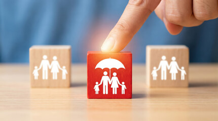 Selecting red wooden block with family icon sheltered by umbrella between natural wooden blocks conveying protection trust and confident insurance choice