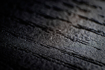 Carbonized Black Wood Surface Macro