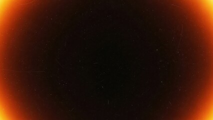 Abstract vintage film burn background with orange light leak