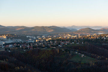 Fototapeta premium Gradina viewpoint at mountain Zlatibor offering beautiful view of city of Zlatibor in valley at morning, visit Serbia