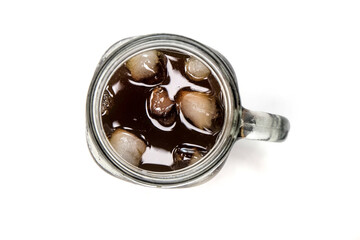 iced americano with ice cubes in a glass, isolated on white background, seen from above