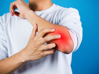 Skin allergy to the human body Person touching elbow with red inflammation and pain