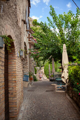 Street view from famous italian old town Limone on the coast of Garda lake