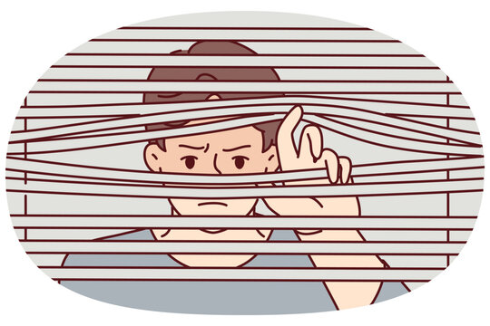 Man peeks through closed blinds to follow neighbor or find out secret information that is being hidden from him. Guy with suspicion and fear looks out window suffering from paranoia or schizophrenia