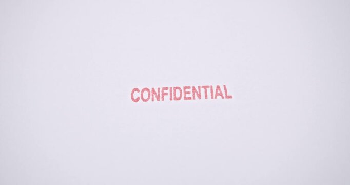 Red confidential stamp representing sensitive data, classified documents, cybersecurity threats, and growing global risk linked to US-China political and technological tensions.