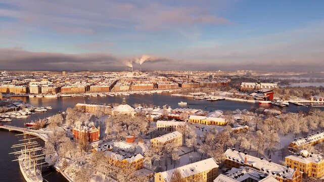 Beautiful view of Stockholm, Skeppholmen and &Ouml;stermalm after a snowstorm, with frozen and snowy buildings in the sun