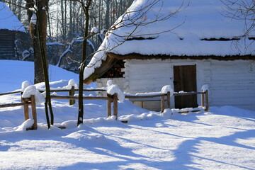 Old abandoned village, wooden houses, winter, snow, frost, tradition, difficult living conditions, Eastern Europe