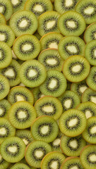 Perfect for foodthemed designs, recipe books, menus, and healthy eating promotions. Vibrant, fresh kiwi slices are arranged densely with seeds.