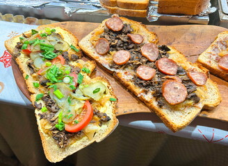 Pajda, smale or smalczyk. A large Polish sandwich with lard and rendered fat. Traditional Polish cuisine, a sandwich stand.