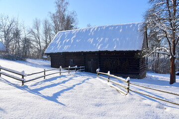 Old abandoned village, wooden houses, winter, snow, frost, tradition, difficult living conditions, Eastern Europe
