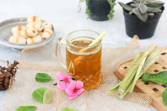 A glass of lemongrass tea, also known as teh serai or teh sereh. It is a type of herbal drink with many health properties.