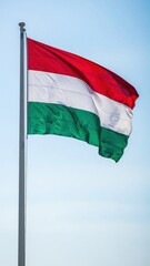 Hungary Flag Waving in Soft Daylight