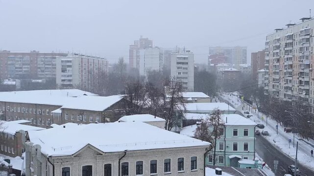 Snowfall in winter day after hurricane frances in Moscow, Russia