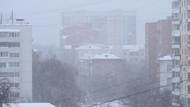 Snowfall in winter day after hurricane frances in Moscow, Russia