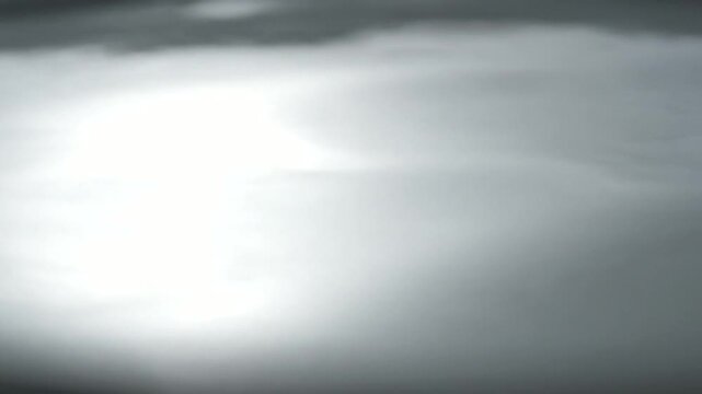 Blurry White Light on Gray Background.