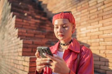 Traveler girl using mobile phone on street in city Fashion gen z asian woman 
Technology connection...