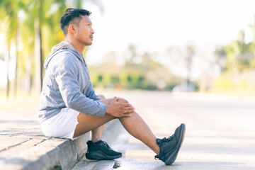 The young man experienced leg pain after exercising, indicating injury and discomfort from sports.