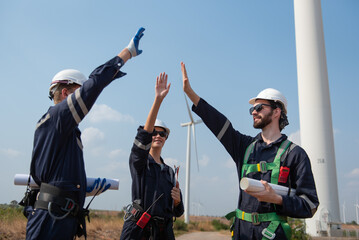 Engineers working on site in wind turbine farm, Wind turbines generate clean energy source, Eco technology for electric, industry environment.