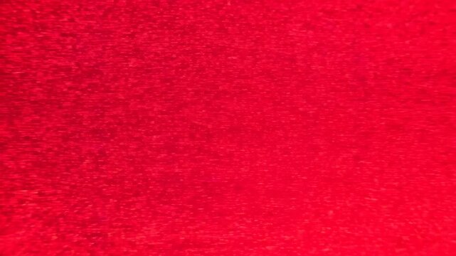 Dynamic abstract red texture transitions in highresolution sequence