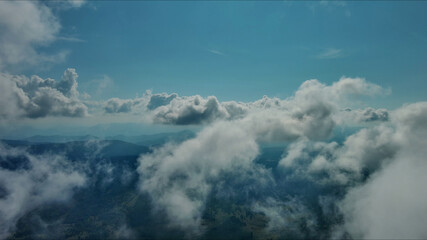 Clouds and mountains, flying in clouds