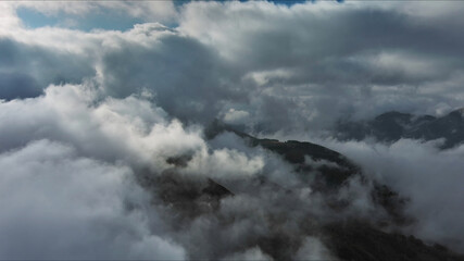 Fototapeta premium Aerial high view of dramatic clouds