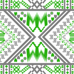Geometric Pattern in Green and Gray: A repeating geometric pattern featuring stylized shapes in shades of green and gray. This eye-catching design creates a visually appealing and dynamic aesthetic.