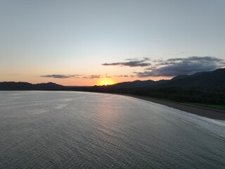 Sunset glow over peaceful Tambor Beach, Costa Rica