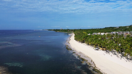 Tropical beach with white sand and palm trees