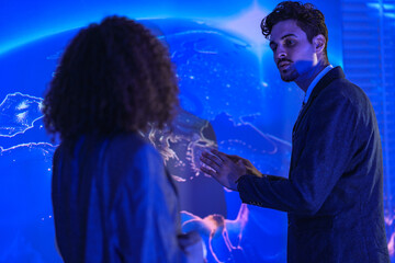 Corporate security experts discussing digital safety strategy. Business partners analyzing network protection and privacy lock concept in modern blue tech office.