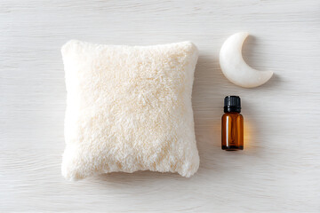 modern home decor, stylish arrangement of plush pillow, essential oil, moon-shaped stone, soft shadows on white wood, ample negative space in the center