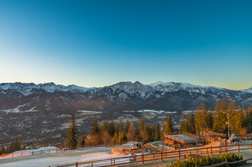 Tatry mountains at sunrise seen from Gubalowka hill in Zakopane. Poland