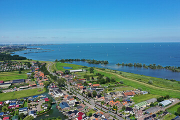 Drone photo of the village Onderdijk, near Medemblik. Surrounded by many ponds and grassland.