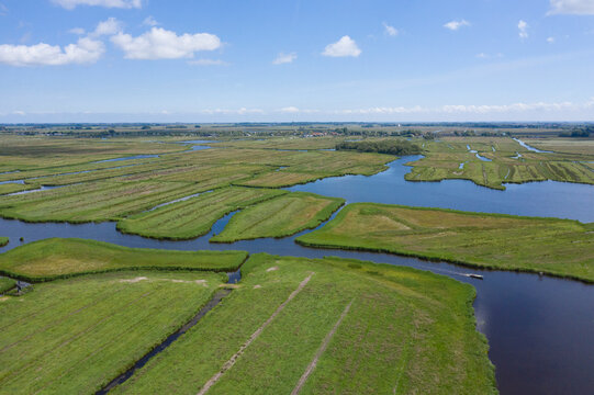Aerial view of  over Historic dutch Waterland landscape in may, the ilperveld near Den Ilp and Landsmeer the  Netherlands