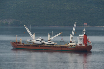 Fototapeta premium Ship for yachts and boats transportation