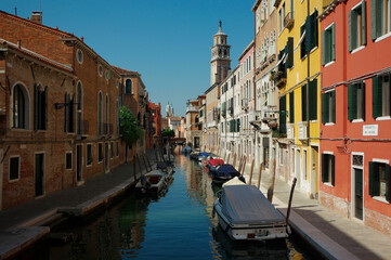 View of Venice with boats, canal, bridge and houses