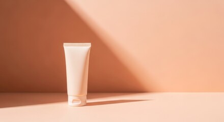 White Cosmetic Tube on Pink Surface.