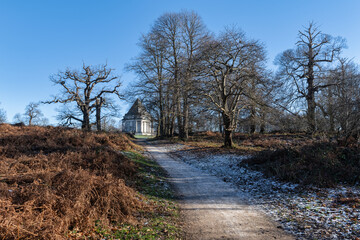 Cobham Country Park and the Darnley Mausaleum near Rochester in Kent on a cold winters day.  Some snow is still laying on the ground. 
