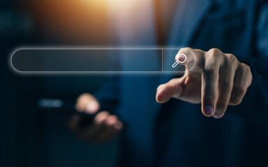 Businessman touching virtual search bar icon, representing online search, information retrieval, digital marketing, data discovery, and user search experience concept.