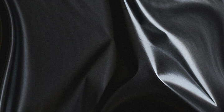 a close up view of a dark sleek and shiny black fabric with dramatic folds and reflections high quality professional detailed