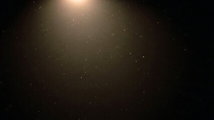 Obraz premium Darkness with a single spotlight shining.