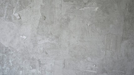 Fototapeta premium Grungy gray concrete wall texture background with rough, weathered surface and abstract patterns, ideal for design elements and urban backdrops