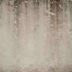 Obraz premium A close-up view of a weathered concrete wall with peeling paint and stains