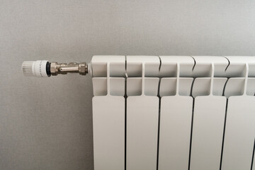 Radiator heating, concepts of heat and energy conservation and the importance of rational use of resources in the cold season. Turning on and off the heating.