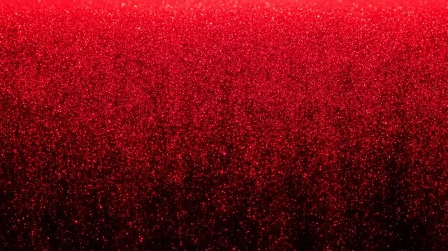 Vibrant red glitter falling against black background in dynamic motion