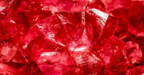 Amethyst red crystals. Gems. Mineral crystals in the natural environment. Texture of precious and semiprecious stones. Seamless background with copy space colored shiny surface of precious stones. © Vera