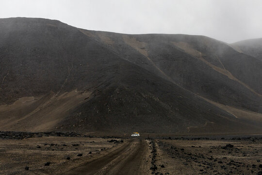 Road in the mountains in Iceland on a cloudy day
